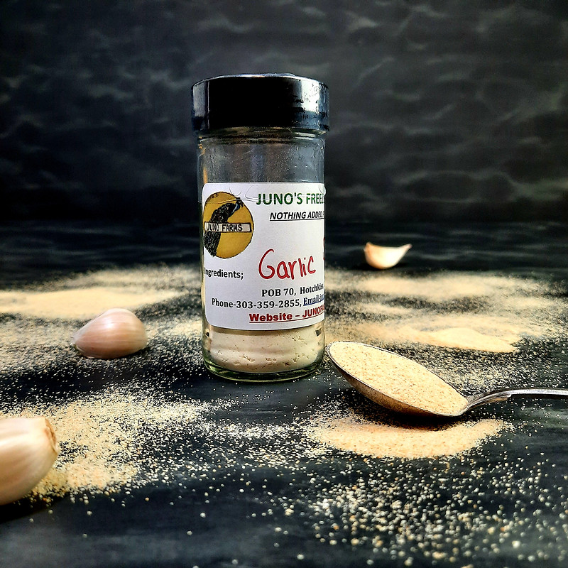 Juno's freeze-dried garlic powder, hand-labeled jar with garlic cloves